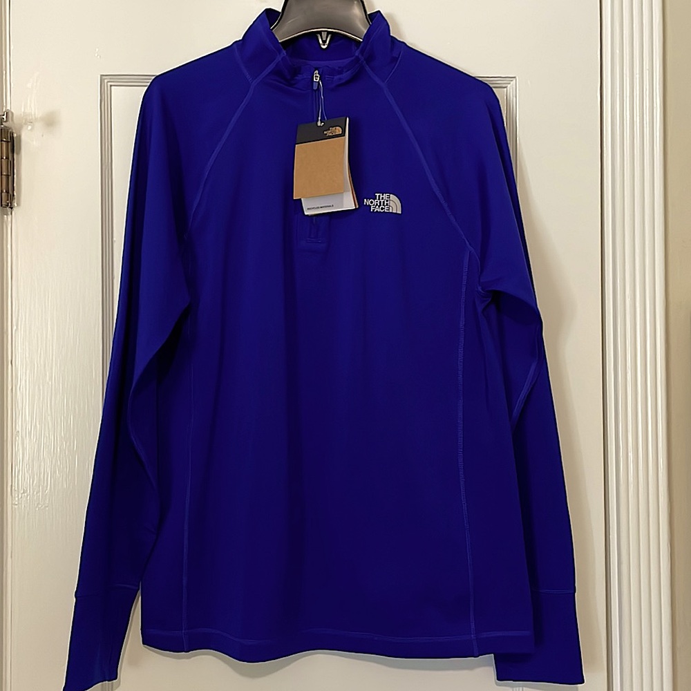 The North Face men’s quarter zip. Lapis blue size M new with tags